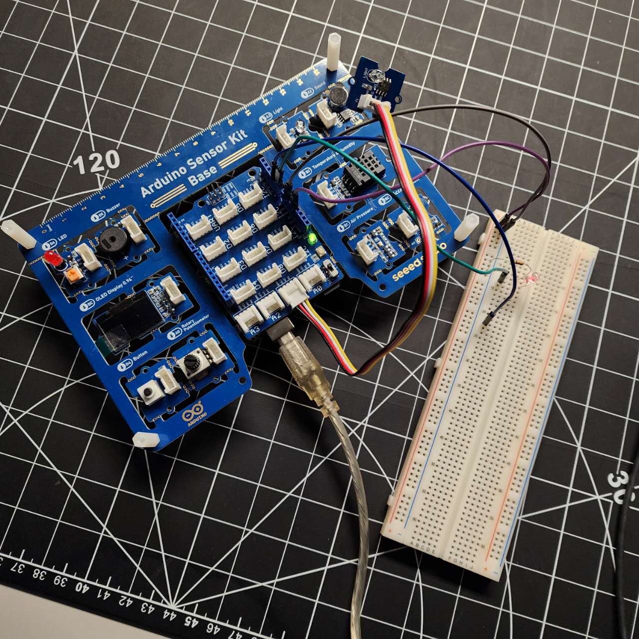 Refined the circuit by adding the light sensor to collect data upon the environment's brightness which also outputs the light levels on Arduino IDE.